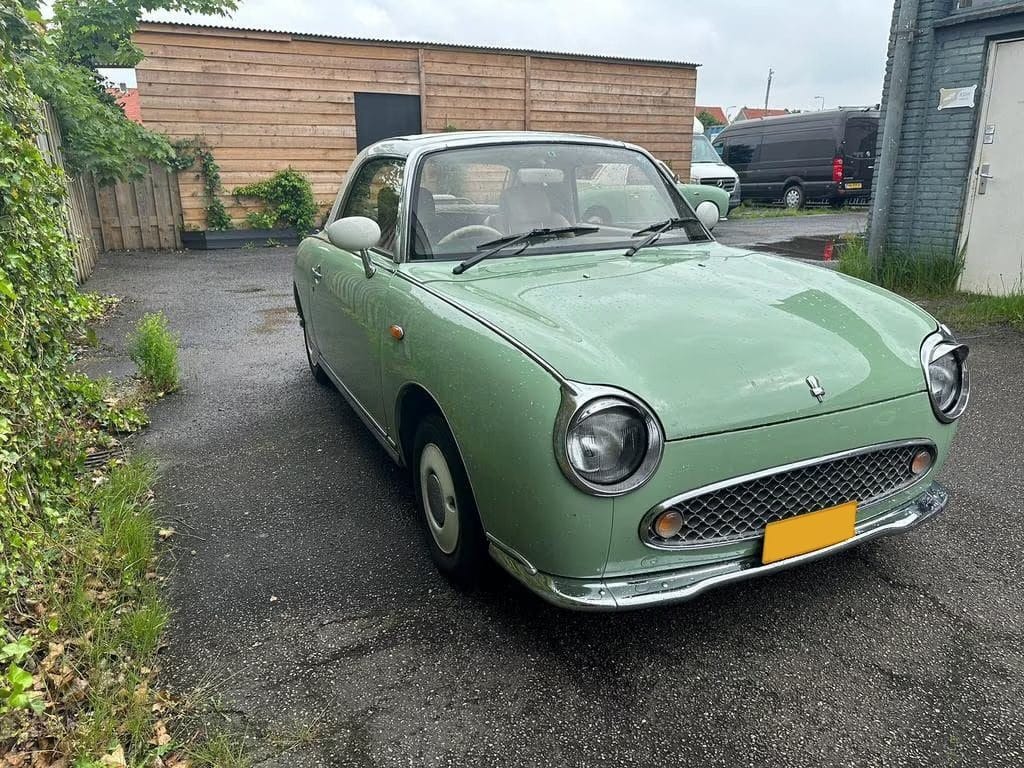 Nissan Figaro Emerald Green exterior Nissan Figaro Emerald Green exterior
