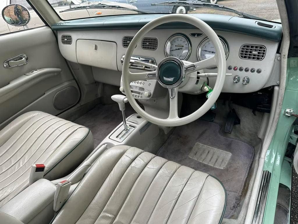 Nissan Figaro Emerald Green interior Nissan Figaro Emerald Green interior