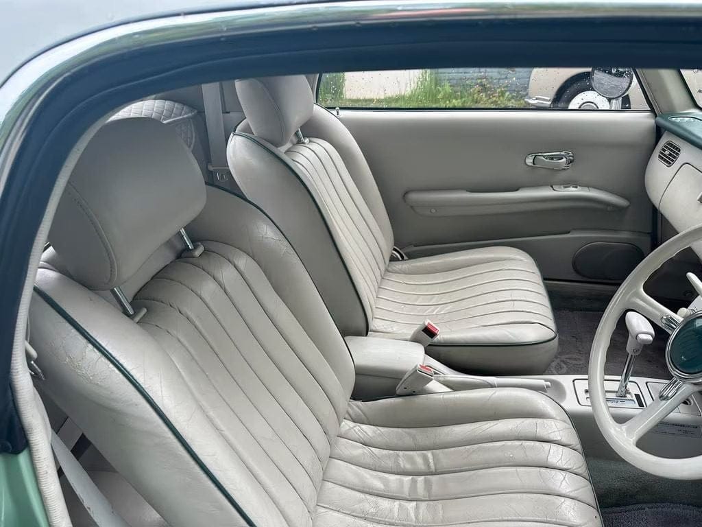 Nissan Figaro Emerald Green interior Nissan Figaro Emerald Green interior